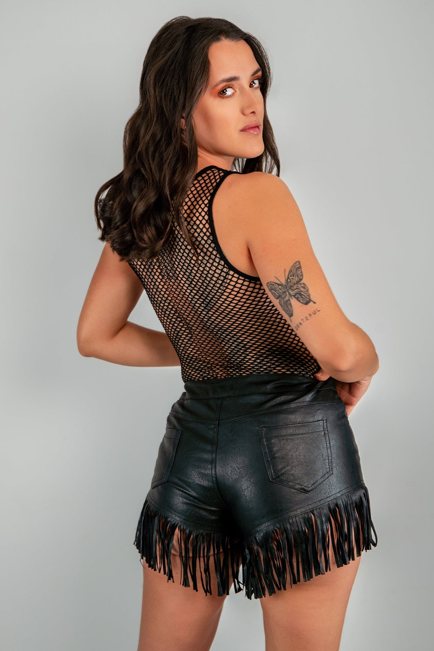 Shorts con flecos